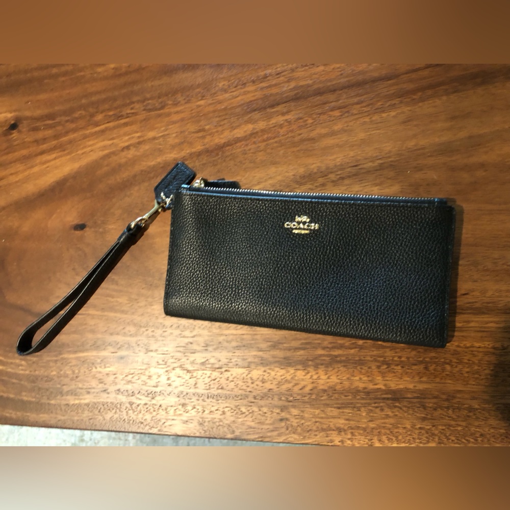 Coach wristlet black gold good condition